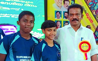 Minister Radhakrishnan with students- Sports Kit Distribution